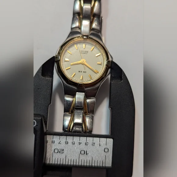 Citizen Wristwatch Silver & Gold Tone Stainless Steel Band Wr 100